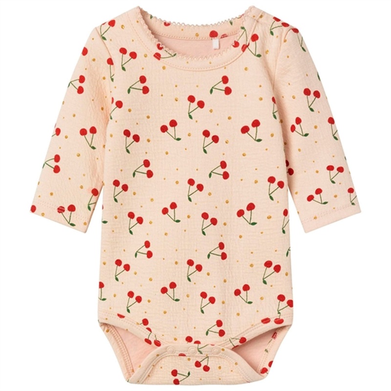 Name it Crme De Pche Dolly Body